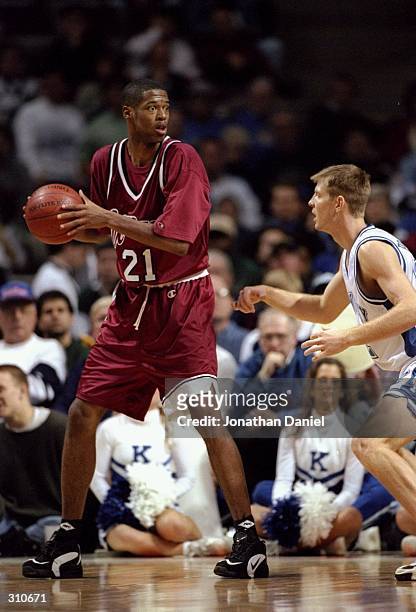 Center Marcus Camby of the Massachusetts Minutemen looks on during a game against the Kentucky Wildcats at the Palace in Wisconsin. UMass won the...