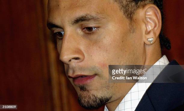 Manchester United footballer Rio Ferdinand leaves a press conference after his appeal to lift his eight month ban for missing a drugs test failed on...