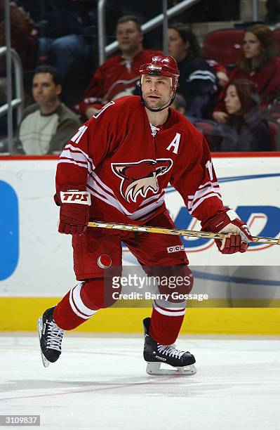 Center Daymond Langkow of the Phoenix Coyotes skates on the ice during the game against the Dallas Stars on February 14, 2004 at Glendale Arena in...