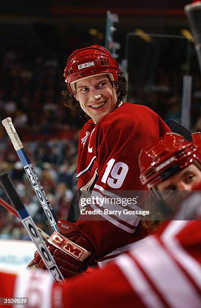 Right wing Shane Doan of the Phoenix Coyotes sits on the bench during the game against the Dallas Stars on February 14, 2004 at Glendale Arena in...