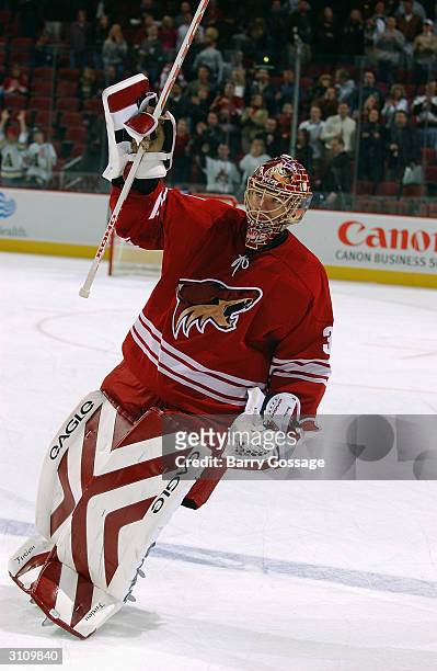 Goalie Brian Boucher of the Phoenix Coyotes skates on the ice during the game against the Dallas Stars on February 14, 2004 at Glendale Arena in...