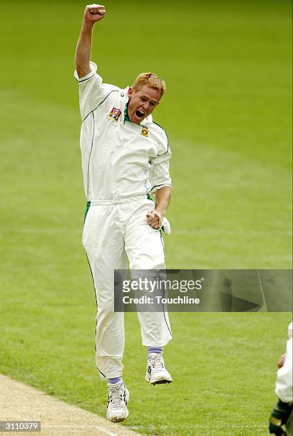 Shaun Pollock of South Africa jumps for joy as he breaks Allan Donalds' record of 331 wickets during the second day of the 2nd Test between the...