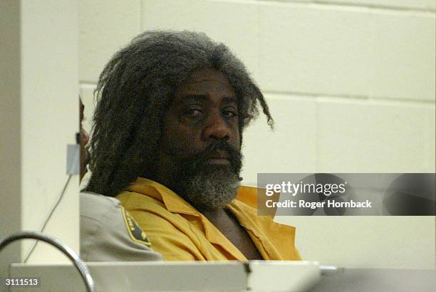 Accused killer Marcus Wesson waits to see the judge during his arraignment March 17, 2004 in Fresno, California. Wesson is accused of shooting nine...