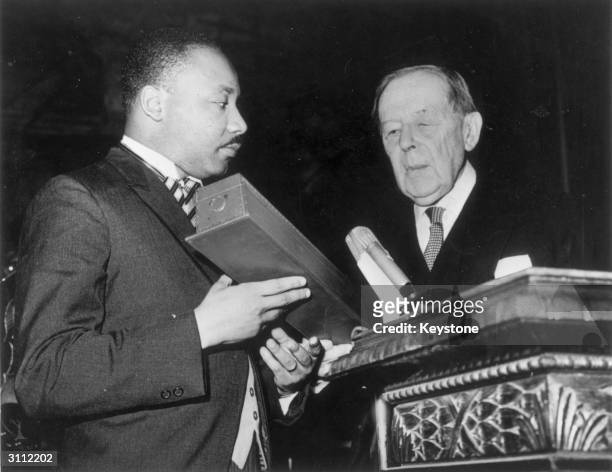 American civil rights leader Martin Luther King receives the Nobel Prize for Peace from Gunnar Jahn, president of the Nobel Prize Committee, in Oslo.
