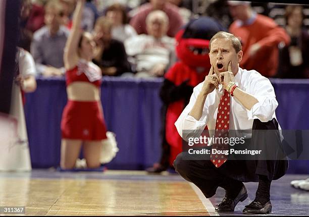 Coach John Beilein of the Richmond Spiders looks on during a game against the South Carolina Gamecocks in the first round of the NCAA Tournament at...