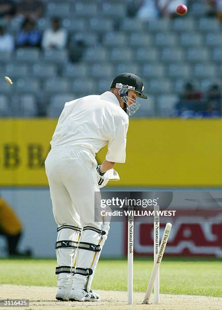 New Zealand batsman Chris Martin is clean bowled by South African paceman Shaun Pollock on the fourth day of the second Test Match, at Eden Park in...