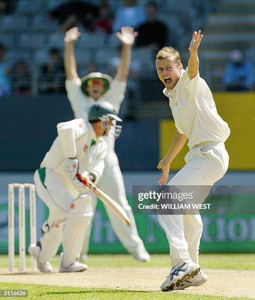 New Zealand paceman Chris Martin and captain Stephen Fleming appeal for an LBW decision against South African batsman Jacques Rudolph on the fourth...