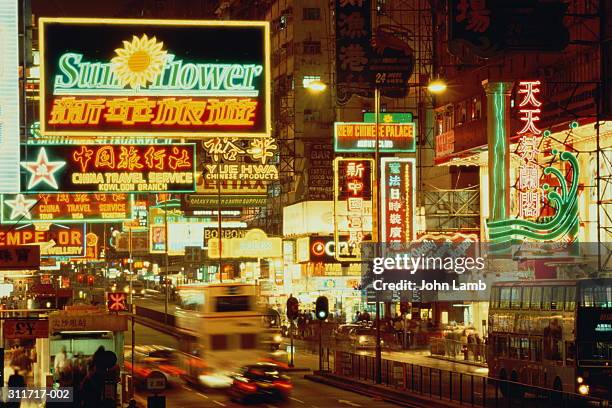 hong kong,kowloon,nathan road lined with neon signs - kowloon stock pictures, royalty-free photos & images