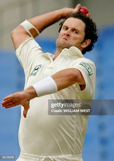 New Zealand bowler Chris Cairns bowls at the South African batsman as he becomes only the sixth cricketer to take 200 Test wickets and score 3000...