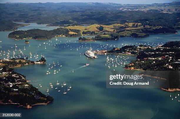 new zealand, bay of islands, opua, aerial view over yachts and liner - bay of islands stock pictures, royalty-free photos & images