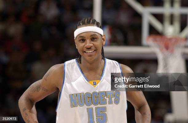 Carmelo Anthony of the Denver Nuggets during the game against the Utah Jazz at the Pepsi Center on March 14, 2004 in Denver, Colorado. The Nuggets...