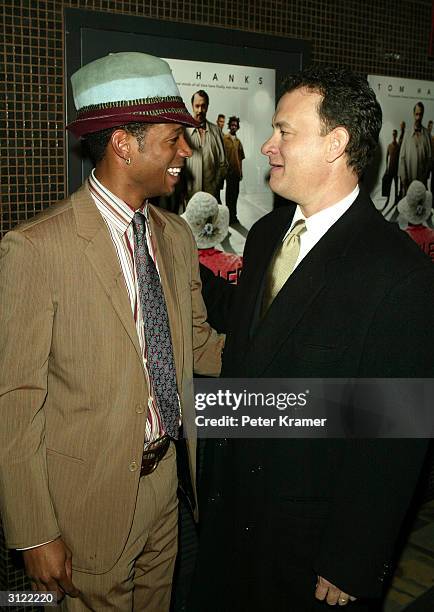 Actors Marlon Wayans and Tom Hanks attend a private screening of "The Ladykillers" on March 22, 2004 at the Landmark Sunshine Cinema, in New York...