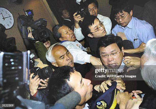 Fight breaks out between DPP and KMT parliamentarians, including Kuomintang parliament whip Liao Feng-teh and Lin Feng-hsi of the ruling DPP, in a...