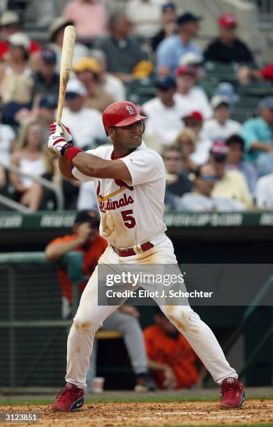 First baseman Albert Pujols of the St. Louis Cardinals at bat during the Spring Training game against the Baltimore Orioles on March 9, 2004 at Roger...