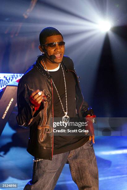 Usher performs for AOL to celebrate his new album release "Confessions" at Webster Hall March 23, 2004 in New York City.