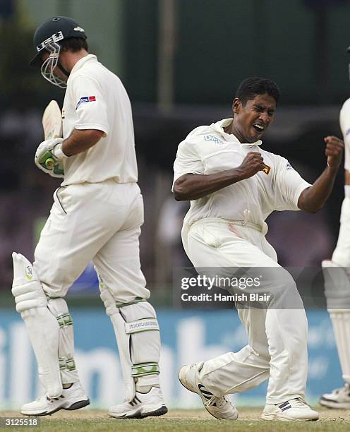 Chaminda Vaas of Sri Lanka celebrates the wicket of Ricky Ponting of Australia during day one of the Third Test between Australia and Sri Lanka...