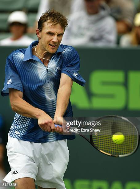 Karol Kucera of Slovakia returns a shot against Alex Bogomolov Jr. Of the USA on March 24, 2004 during the first round at Nasdaq 100 Open in Miami,...