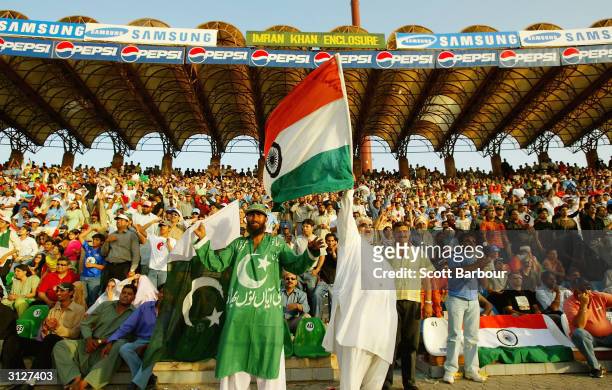 Pakistan and India supporters watch the match in the stands during the fifth Pakistan v India one-day international match played at the Gadaffi...