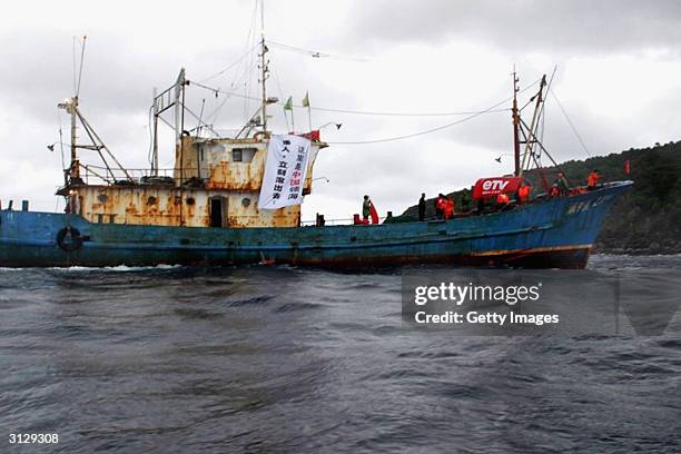 This handout photo from the Japanese Coast Guard shows a Chinese registered ship that was used in a protest over the sovereignty of one of the five...