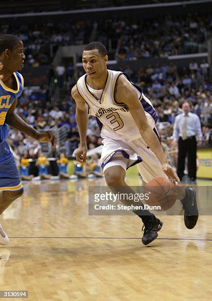 Brandon Roy of the Washington Huskies drives to the hoop against the UCLA Bruins during the quarterfinals of the 2004 Pacific Life Pac-10 Tournament...