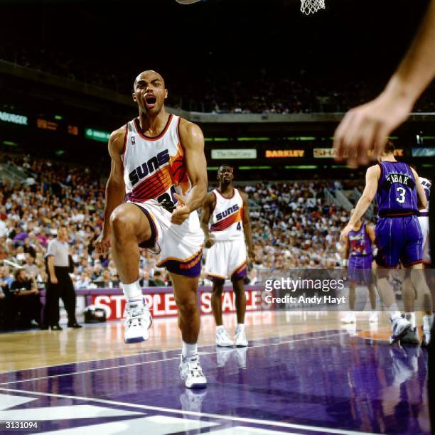 Charles Barkley of the Phoenix Suns shows emotion during an NBA game against the Toronto Raptors circa 1996 at America West Arena in Phoenix,...