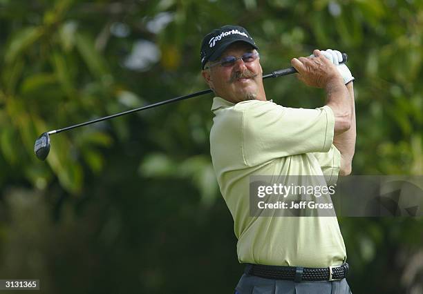 Gary McCord hits a shot during the second round of the Toshiba Senior Classic on March 20, 2004 at the Newport Beach Country Club in Newport Beach,...