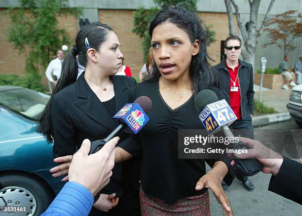 Kiani Wesson talks to the media in front of Fresno Superior Court after her father, Marcus Wesson was arraigned for the slayings of nine of his...