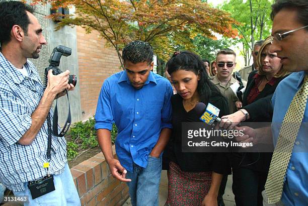 Kiani and Almae Wesson walks in front of Fresno Superior Court after their father, Marcus Wesson was arraigned for the slayings of nine of his family...