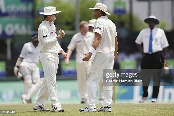 Damien Martyn and Shane Warne of Australia discuss an incident that lead to the third umpire being called to investigate an appeal for hit wicket...