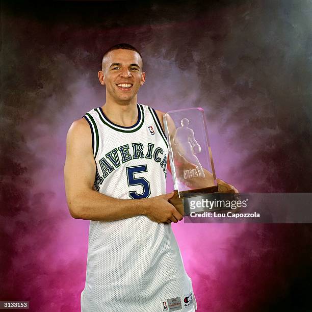 Jason Kidd of the Dallas Mavericks poses for a portrait with the Rookie of the Year Trophy circa 1995 in Dallas, Texas. NOTE TO USER: User expressly...