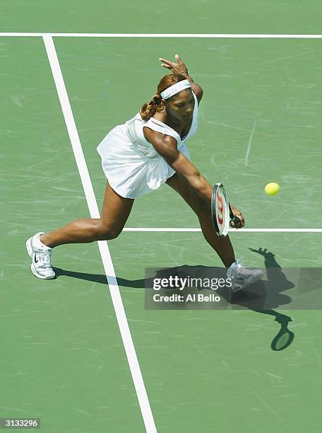 Serena Williams of the USA plays a forehand against Marta Marrero of Spain during The Nasdaq 100 on March 26, 2004 in Miami, Florida.