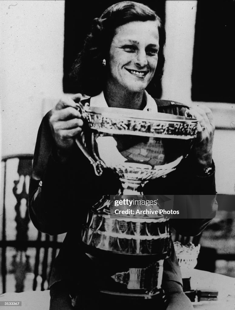 Babe Zaharias With Golf Trophy