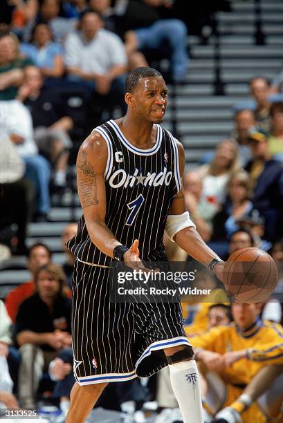 Tracy McGrady of the Orlando Magic reacts to the call during the NBA game against the Golden State Warriors at The Arena in Oakland on March 17, 2004...