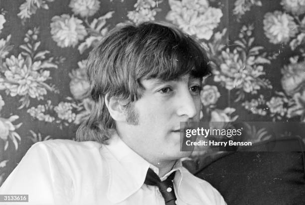 John Lennon of the Beatles, after making a formal apology for his controversial statement that the group were 'more popular than Jesus'.