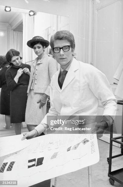 Yves Saint-Laurent, ex-wonder boy of Dior, working at his own fashion house in Paris.
