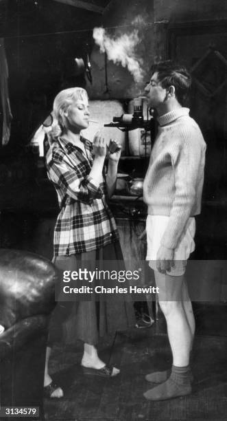 Mary Ure plays Alison Porter and Alan Bates plays Cliff Lewis in a scene from 'Look Back in Anger' by John Osborne. Produced by the English Stage...