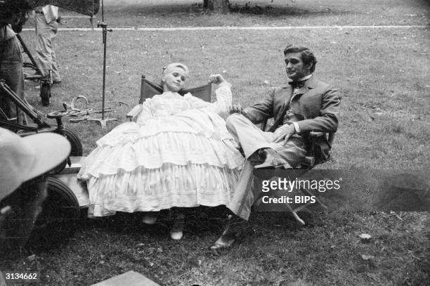 Australian actor Rod Taylor on location in Indiana with Eva Marie Saint for the filming of the American drama Raintree County, 1956.