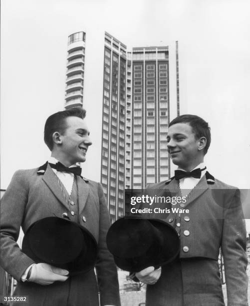 Brothers Terry and Dennis Camps, bellboys at London's Hilton Hotel in Park Lane.