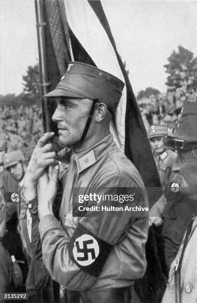 Member of the SA, the paramilitary wing of the Nazi Party, at a rally.