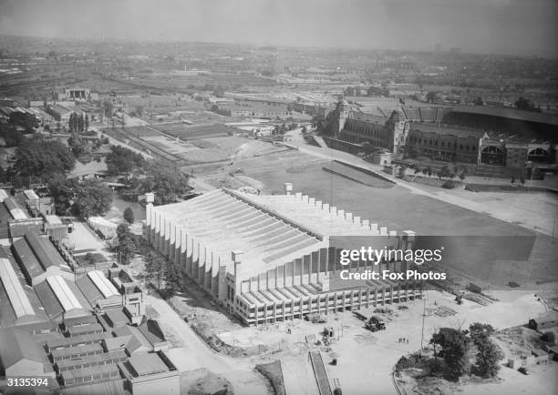 The newly-constructed Empire Pool and Sports Arena at Wembley, next to Wembley stadium, London.