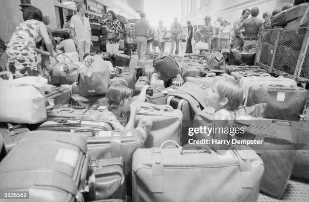 Hundreds of suitcases await their owners at Nicosia Airport on Cyprus.