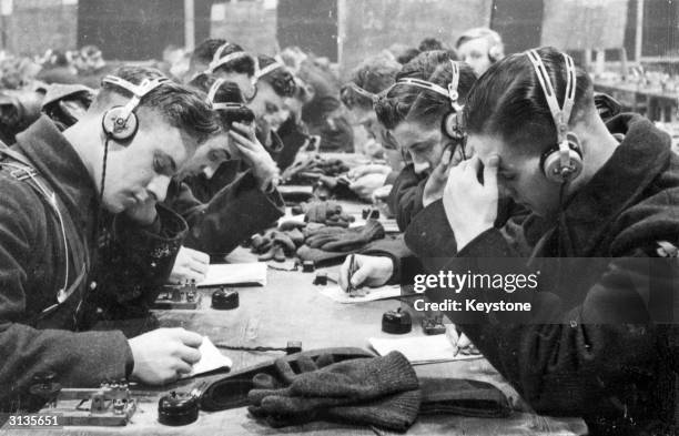 Royal Air Force recruits learning morse code at a training station.