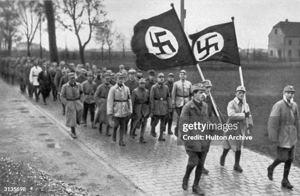 Members of the SA, the paramilitary wing of the Nazi party, during a training march outside Munich.