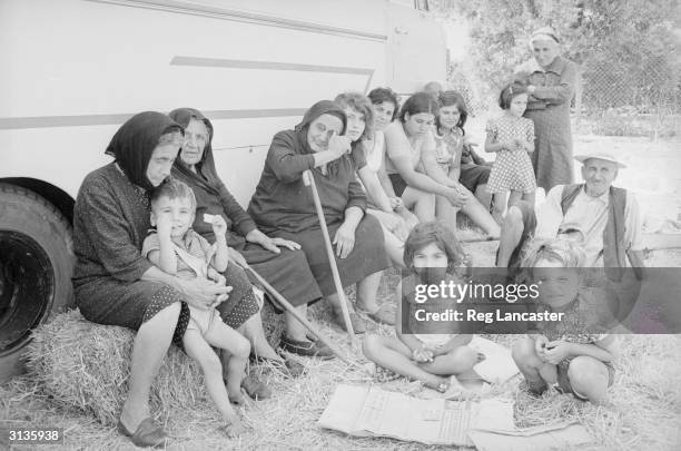 Women, children and the elderly flee the fighting between Greeks and Turks on Cyprus.