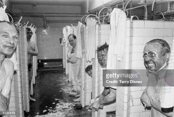 Miners taking a shower after returning to work at the Coleville mine, Leicester.