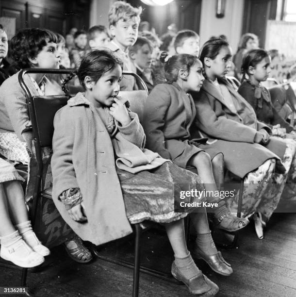 Children from Bethnal Green during a meeting demanding a playground.