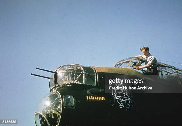 Man Rzf An RAF man cleaning the cockpit windows of a Lancaster bomber. News ...