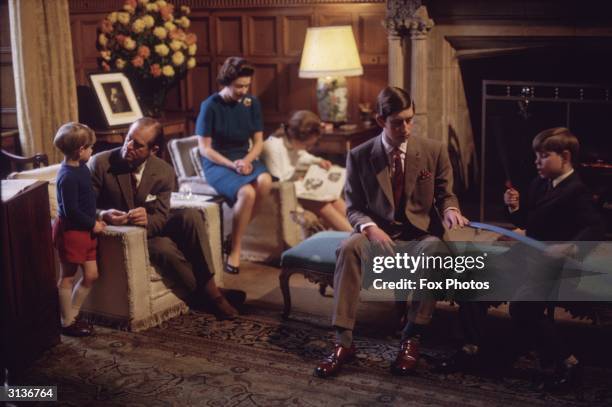 The British royal family at Windsor, 1969. From left: Prince Edward, the Duke of Edinburgh, Queen Elizabeth II of Great Britain, Princess Anne,...