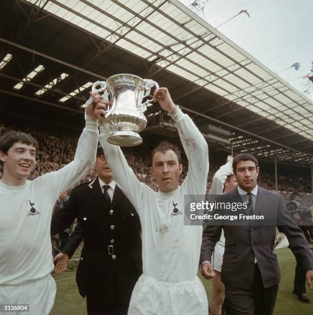 Joe Kinnear and Jimmy Greaves of Tottenham Hotspur football club celebrate after beating Chelsea in the FA Cup Final.