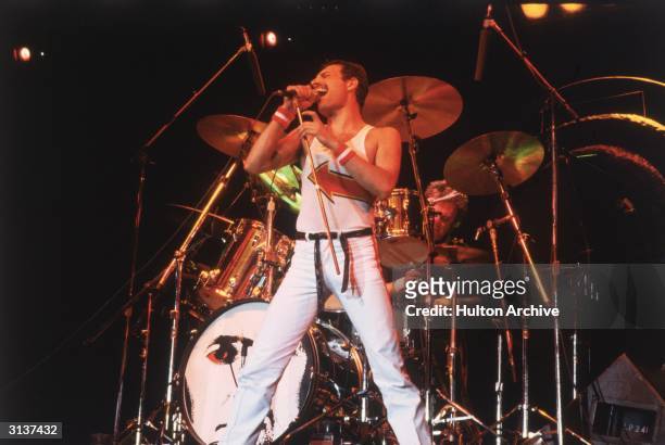 Freddie Mercury , lead singer of 70s hard rock quartet Queen, in concert in Milton Keynes.